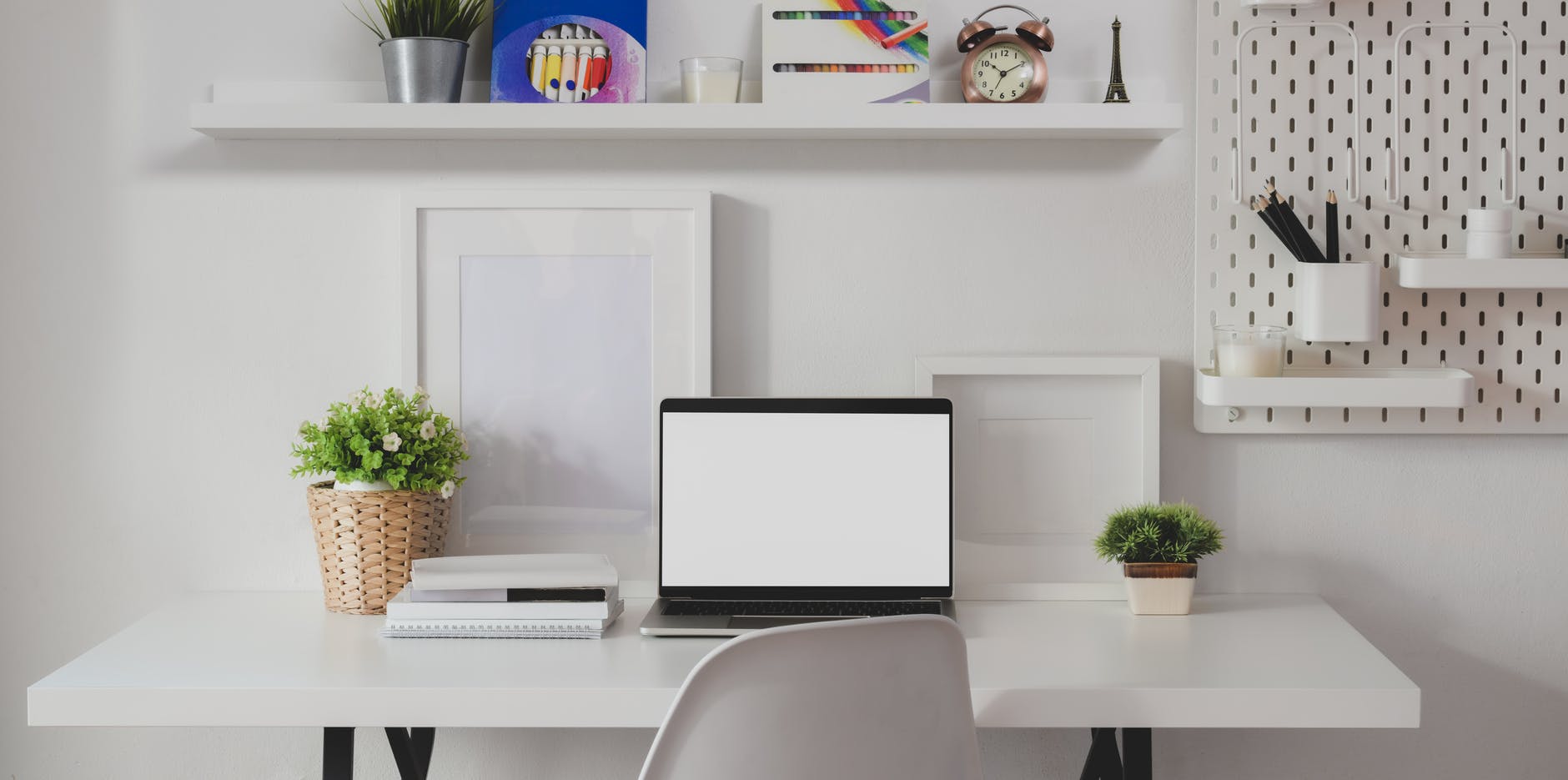 laptop on white wooden table