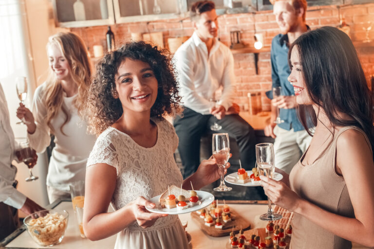 Group of friends party together indoors celebration