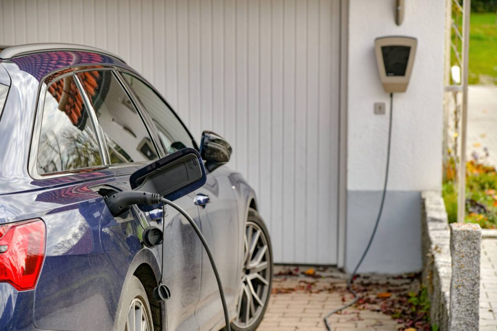 Electric car charging at a home wall-mounted charger