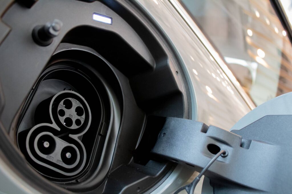 Close-up of a level 1 electric vehicle charging port ready for an EV charger