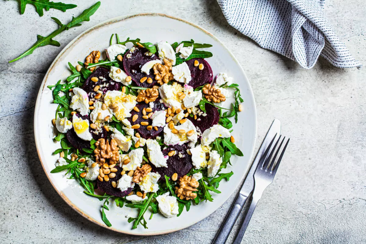 Baked beetroot salad with arugula, nuts and goat cheese, top vie